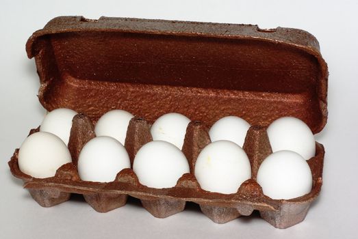 Egg package decorated with copper paint with eggs inside