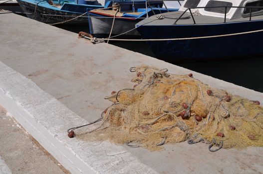 bright yellow fishing net on Kalymnos island, Greece