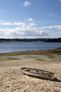 A canoe on the shore of a lake in Kent