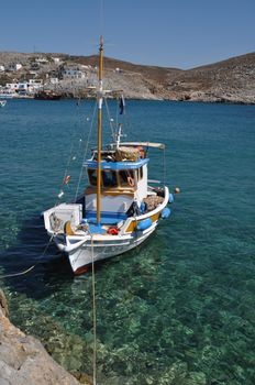 beautiful fishing boat at the bay of Pserimos island, Greece