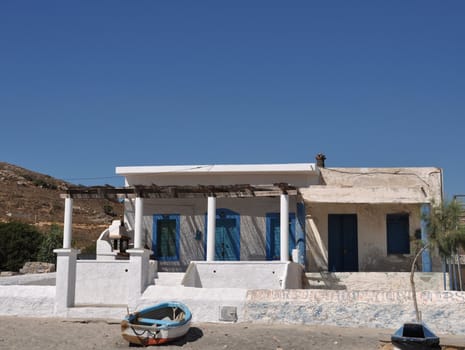 typical blue and white greek house in Pserimos beach