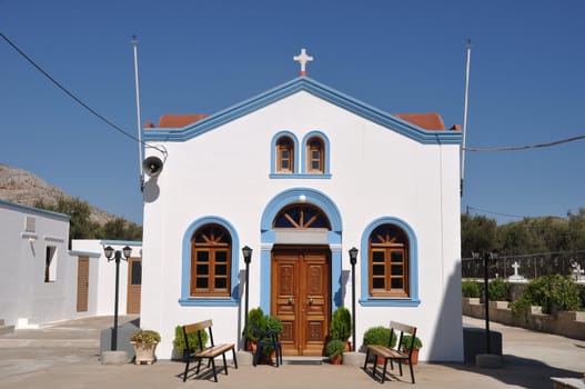 beautiful blue and white church in Pserimos island, Greece