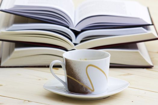 cup of coffee and books