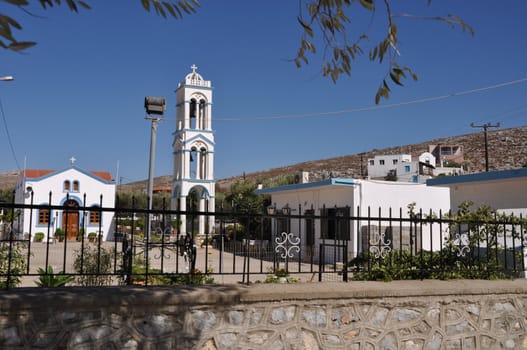 beautiful blue and white church/tower in Pserimos island, Greece