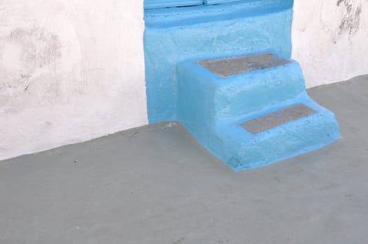 traditional blue greek house stairs in Pserimos island, Greece