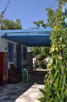 colorful and typical greek taverna scene in Zia (Kos island), Greece