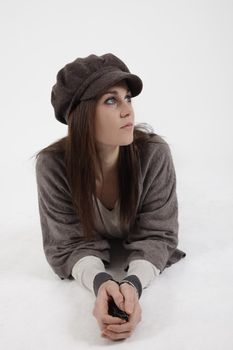 Young woman with grey cap