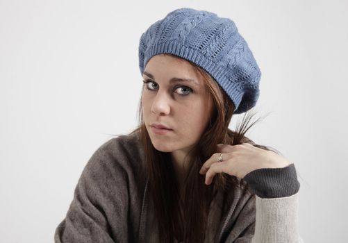 Young woman with blue cap