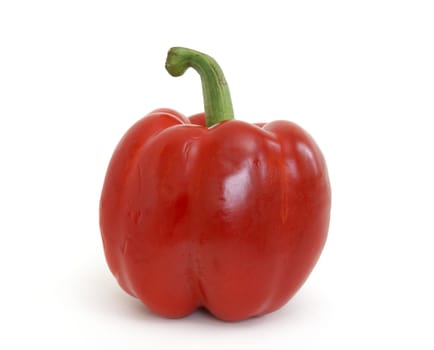A fresh red pepper on white background.