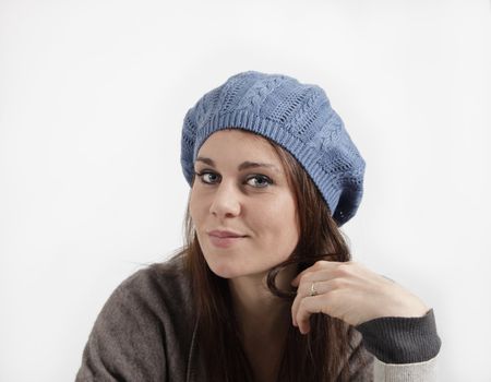 Young woman with blue cap