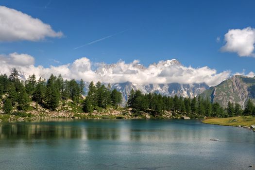 summer view of Arpy lake near La Thuile, Aosta valley, Italy. Image processed with hdr technique