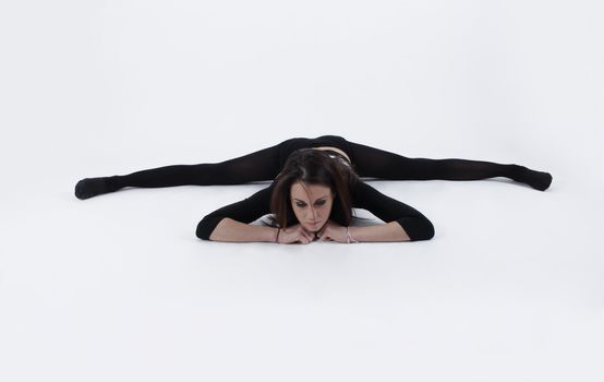 Young gymnast in black looking at the camera