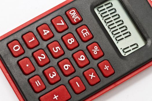 Mini red calculator isolated on white background
