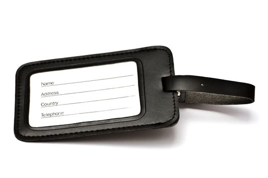 Black leather Luggage tag isolated on white background 

