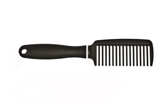 Black comb isolated on white background 
