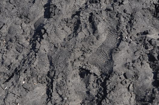 black sand beach background or texture in Greece
