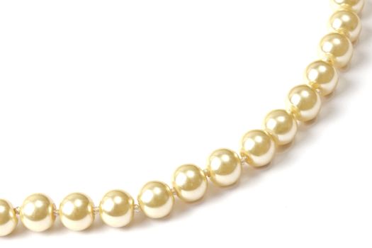 Beautiful string of beads isolated on white background 