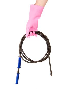 Female hand in a pink glove keeps a hawser for the water drain, isolated, on a white background
