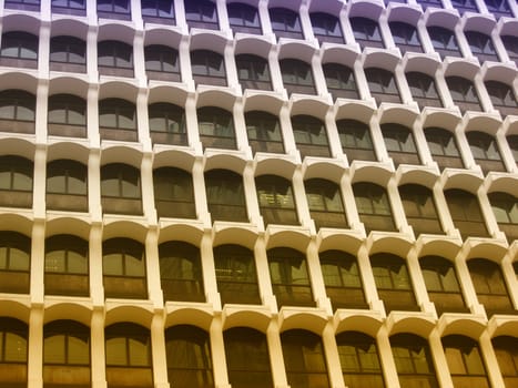 Texture of skyscraper windows background in Hong Kong 
