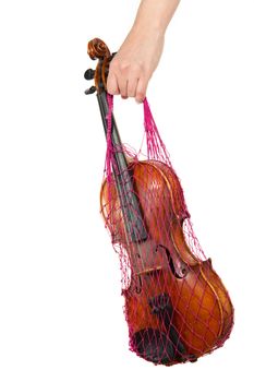 Female hand holding a red mesh with the violin, isolated, on a white background
