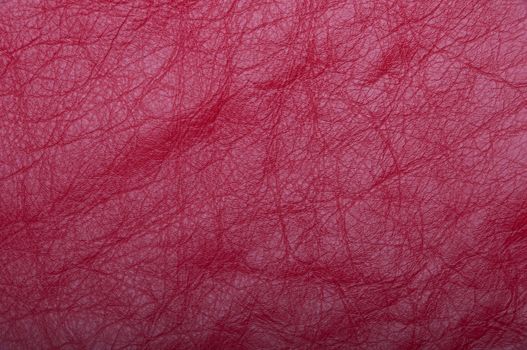 gorgeous red leather scrap background or texture