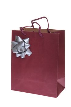 red gift paper bag with grey bow isolated on white background