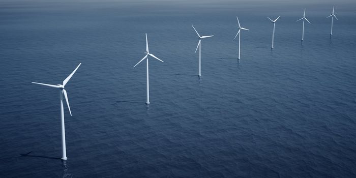 3d rendering of windturbines on the ocean