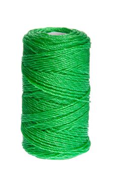 green clew of twine isolated on white background 