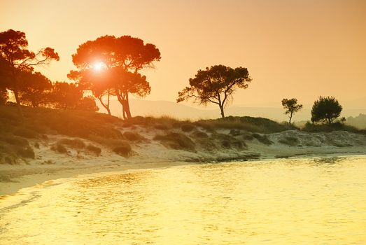 Sunset over Vourvorou beach, Sithonia, Chalkidiki, Greece.