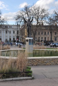 the statue of Gustav Theodore Holst at Memorial Fountain in Cheltenham Imperial gardens, England