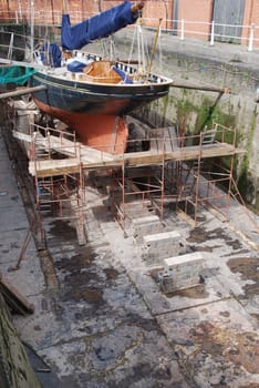 antique boat reparation at dry docks