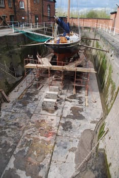 antique boat reparation at dry docks