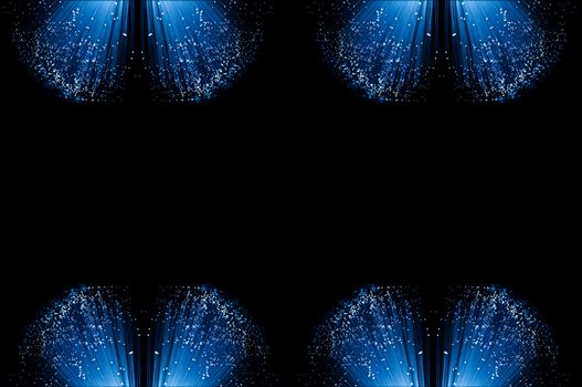 Eight small groups of illuminated fiber optic light strands arranged along the top and bottom border of the image with black background.