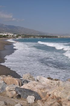 beautiful beach with stone pier in Puerto Banus (Marbella), Spain