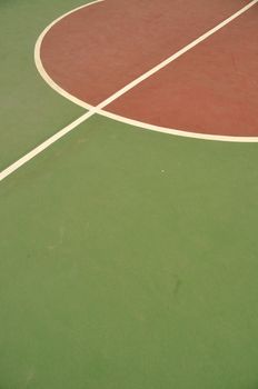 colorful basketball lines on an outdoor court