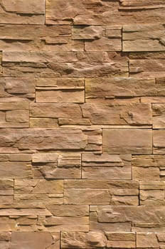 vibrant brown background of a stone wall