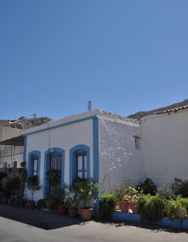 greek house with lovely flowers in Kalymnos island, Greece