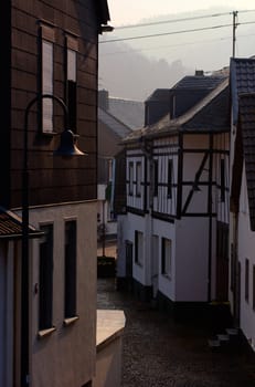 Morning, traditional buildings in town Heimbach, Germany