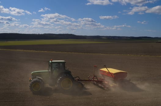 Tractor on farmland a beautiful day