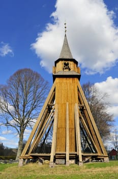 Ancient church-bell tower in wood