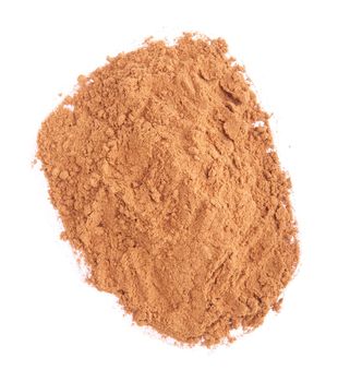 cinnamon spice powder isolated on white background