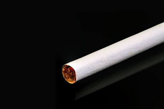 Cigarette isolated on black