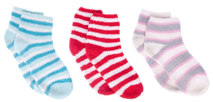 pairs of warm and colorful socks isolated on white background