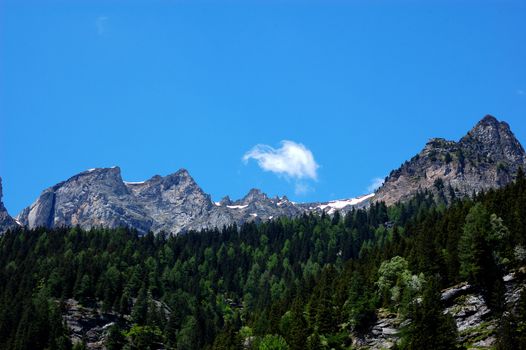 Mountain peaks in summer blue sky (Val Formazza, Italy)
