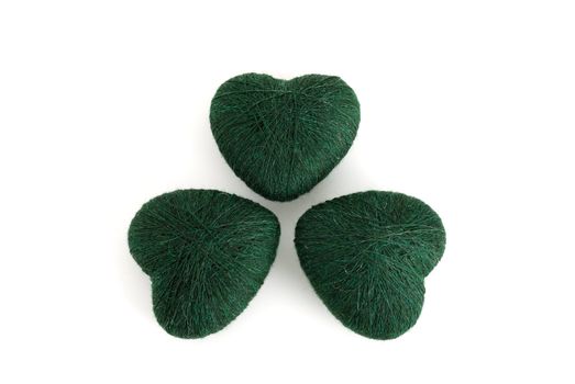 3-leaf clover (shamrock) formed out of green  heart shaped clews on white background