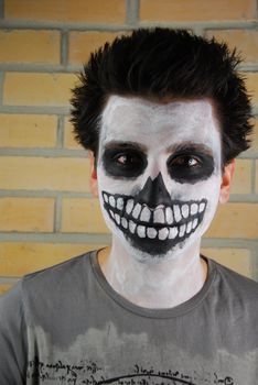 portrait of a creepy skeleton guy perfect for Carnival (brick wall background)
