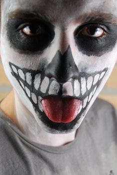 close-up portrait of a creepy skeleton guy perfect for Carnival (brick wall background)
