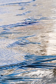 Ice formations on a pond surface in winter