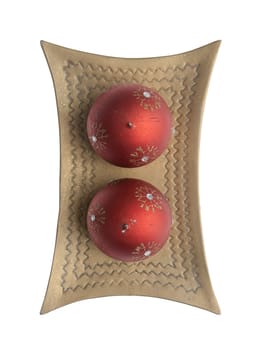 Christmas decoration with red wax candles on a white background.