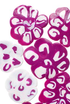 Violet and white flower beads isolated on white background.
